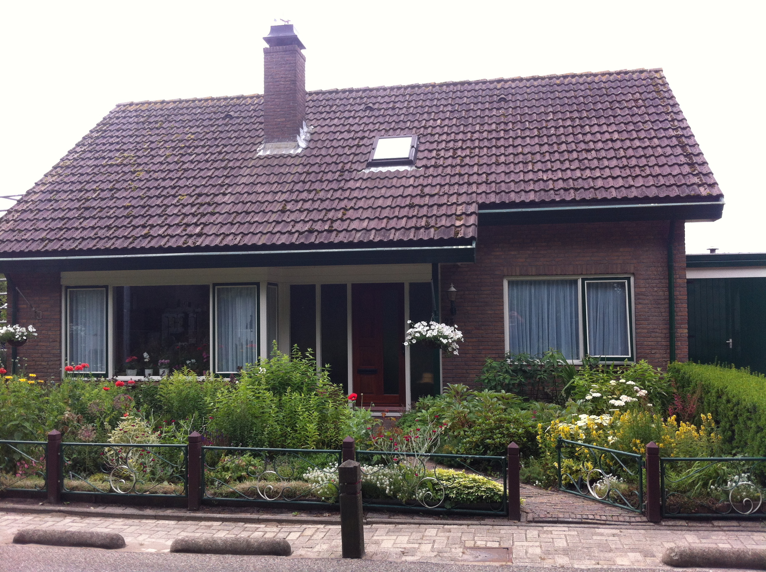 Groot onderhoud buitenzijde aan bungalow