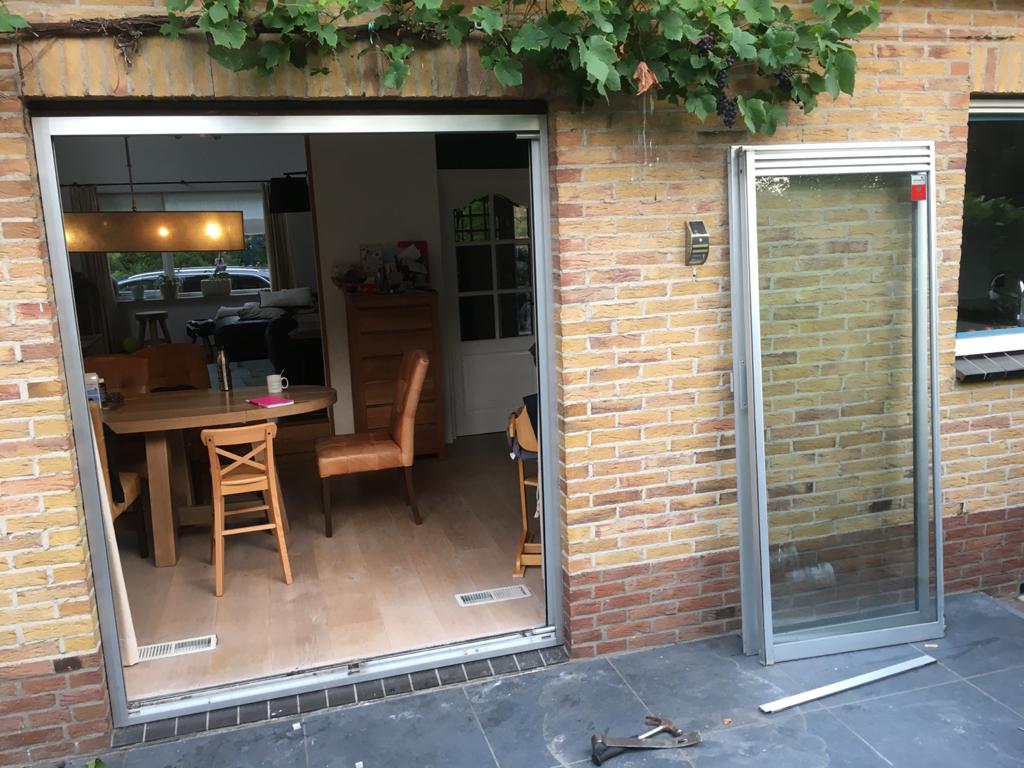 Van aluminium schuifpui naar houten schuifpui